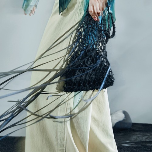 Drawstring woven fashionable hand-held crossbody shoulder bag